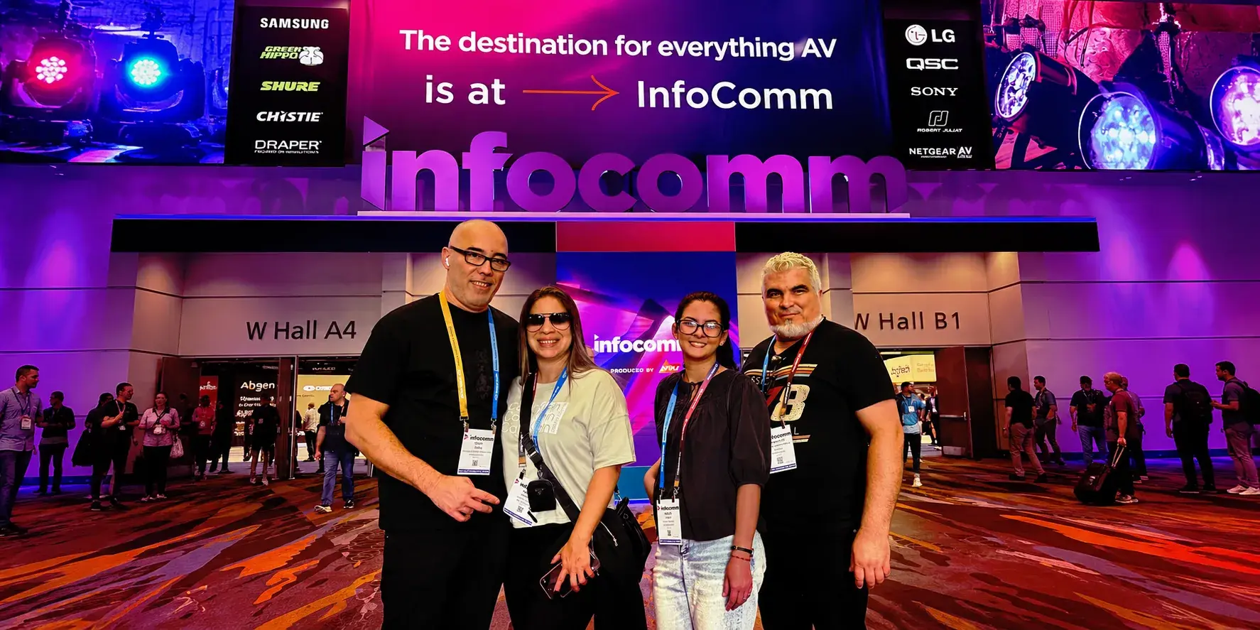 BE Productions team standing together at an event venue