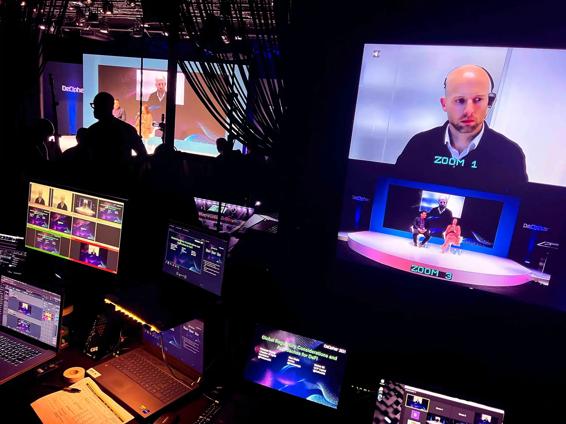Behind-the-scenes hybrid livestream production setup with operators managing broadcast equipment